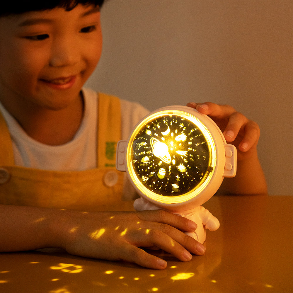 Galaxy star projector in bedroom with starry night effect