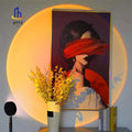 Solstice Sunset Projection Lamp projecting warm sunset glow on wall