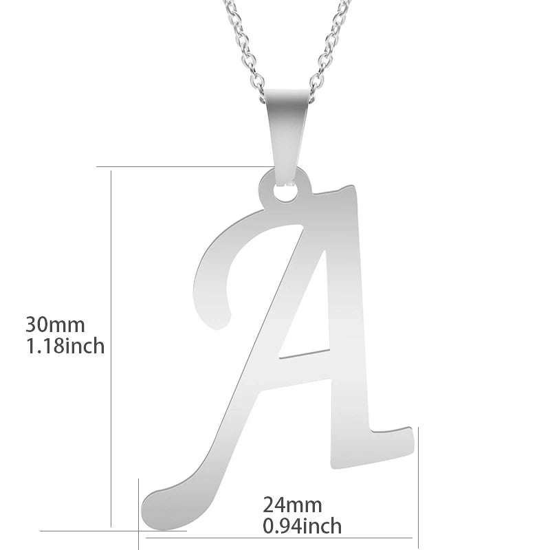 Initial letter pendant necklace, gold tone, on white background